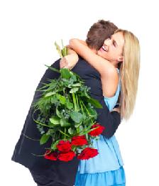 Woman hugging man with Red roses